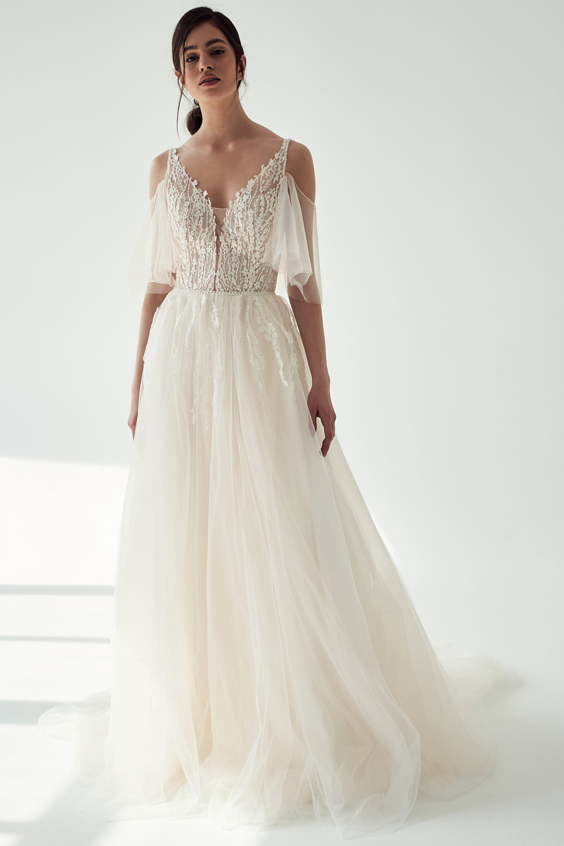 Brautkleid mit Flügelärmeln